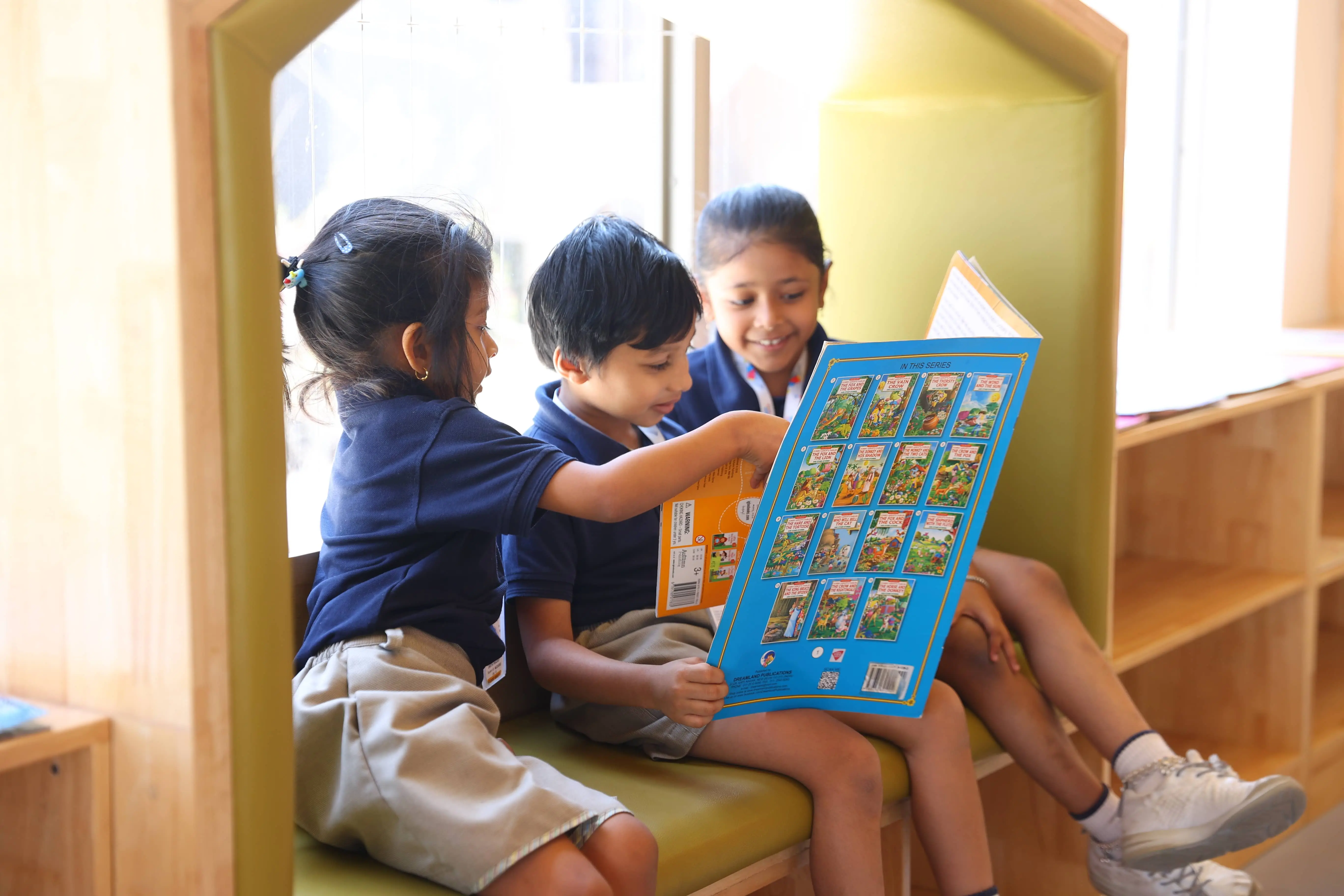 The open layout allows for both individual reading and group storytelling sessions, fostering a community of young readers